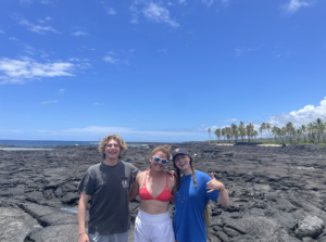Some friends posing by the shoreline 